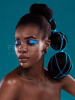 Buy stock photo Thinking, beauty and makeup with a model black woman in studio on a blue background for hair or trendy fashion. Face, cosmetics and idea with an attractive young female person posing for haircare