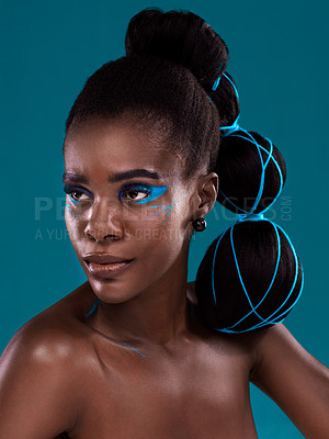 Buy stock photo Idea, beauty and cosmetics with a model african woman in studio on a blue background for hair or fashion. Face, makeup and idea with an attractive young female person posing for trendy haircare