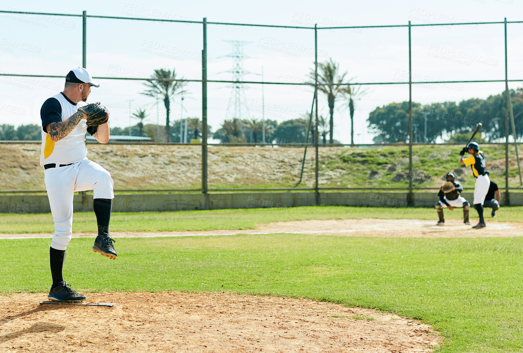 Buy stock photo Man, baseball and pitcher ready with ball for throw, point or match in tournament or outdoor game. Young, male people or player with pitch for competition or score on grass field, pitch or dirt turf