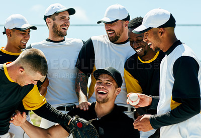 Buy stock photo Cropped shot of a team of baseball players smiling while standing with their coach on the field during the day
