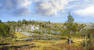 Buy stock photo Landscape view of a mountain range in Bodo and surroundings during the day in summer. Secluded and deserted natural environment in the countryside. Remote natural landmark with greenery