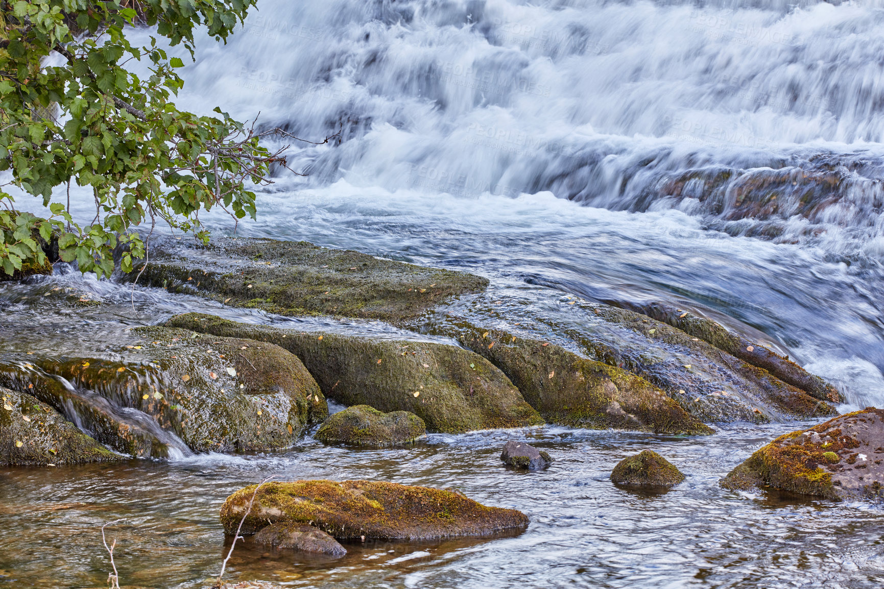 Buy stock photo Mountain stream and waterfall rushing down over rocks and boulders. Beautiful nature landscape natural, fresh river flows between trees in an eco environment in Norway. Scenery on adventure walks