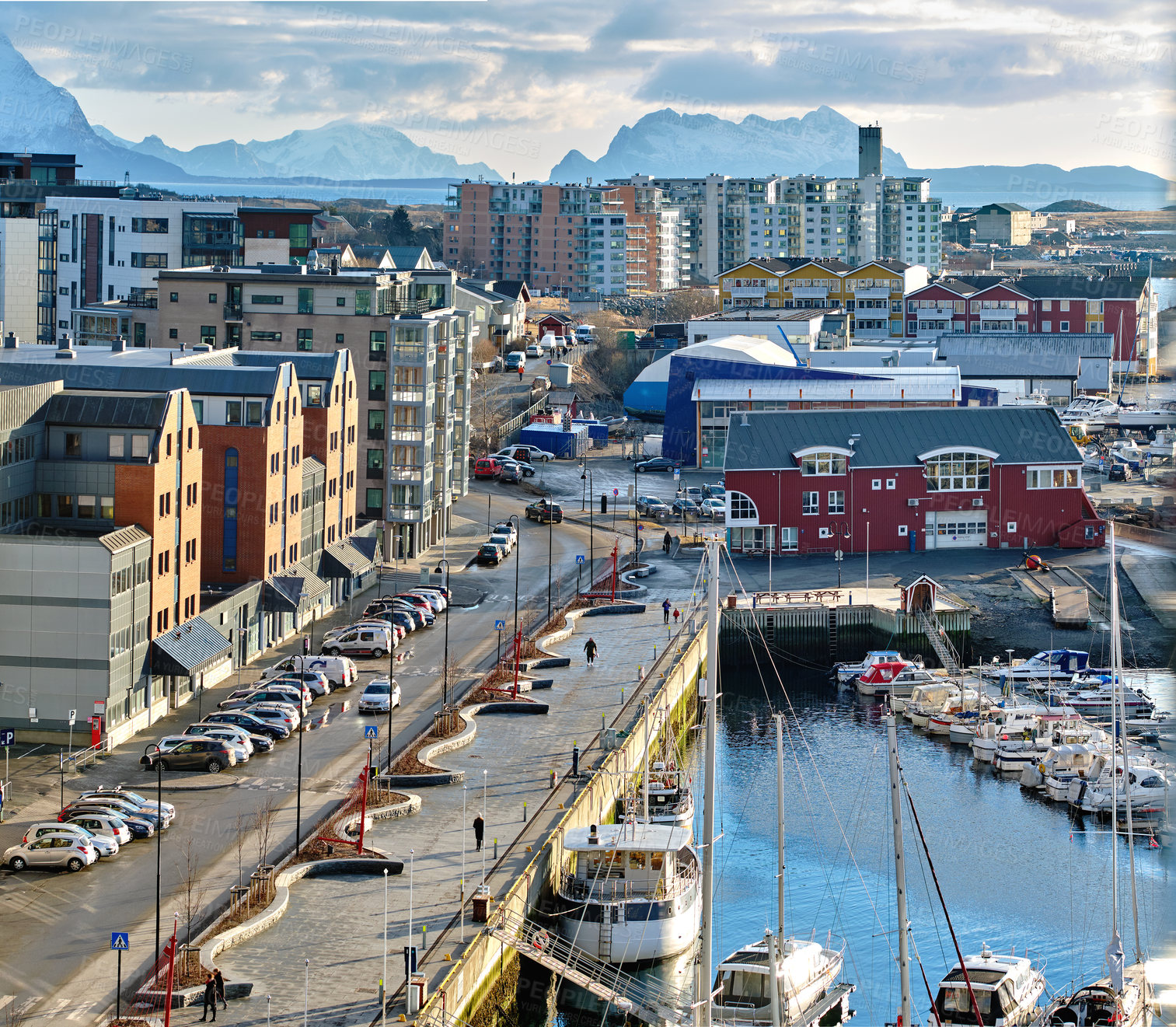 Buy stock photo The busy city of Bodo and its surroundings by the harbor and seaside. Landscape view of a dockyard during the day in summer. Small fishing town for tourists and recreational activities for a holiday