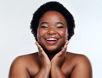 Buy stock photo Studio shot of a beautiful young woman posing against a grey background