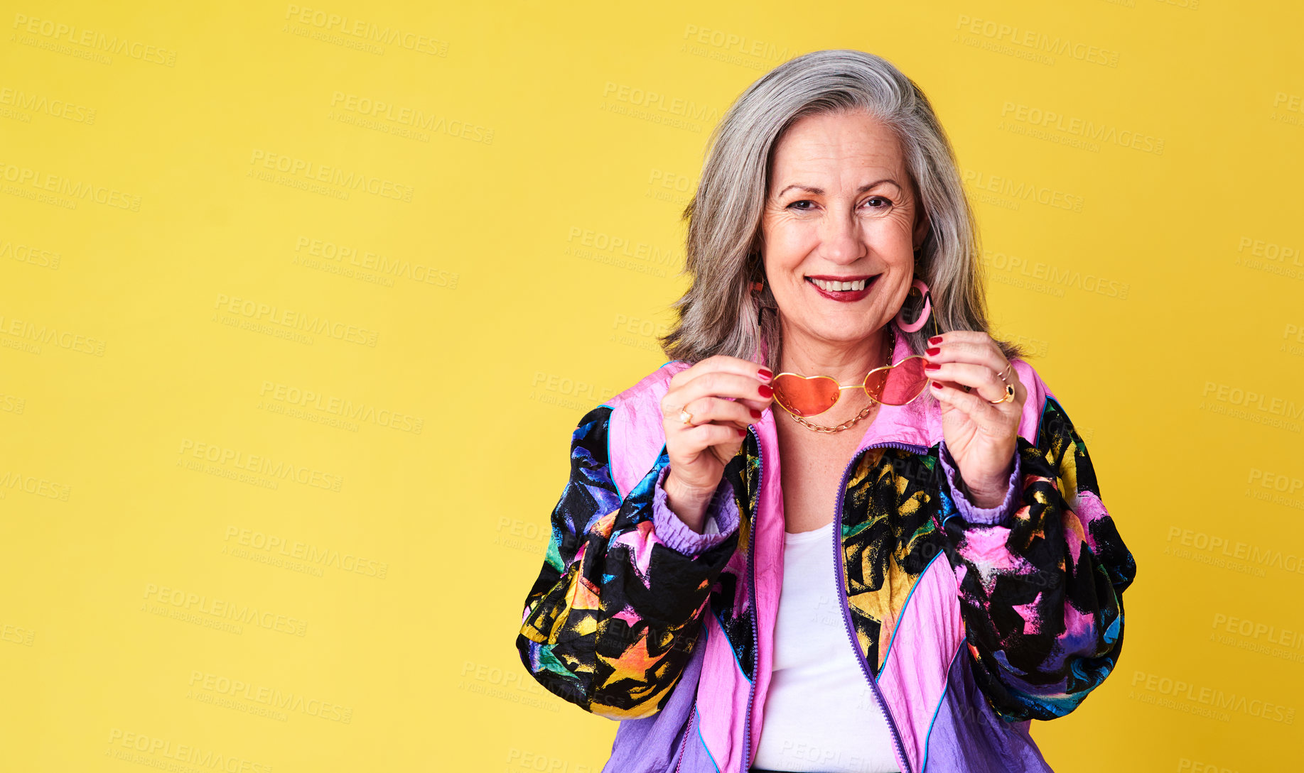 Buy stock photo Portrait of a confident and stylish senior woman posing against a yellow background