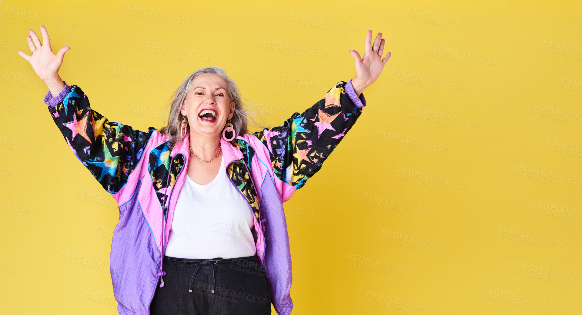 Buy stock photo Portrait of a cheerful and stylish senior woman posing against a yellow background
