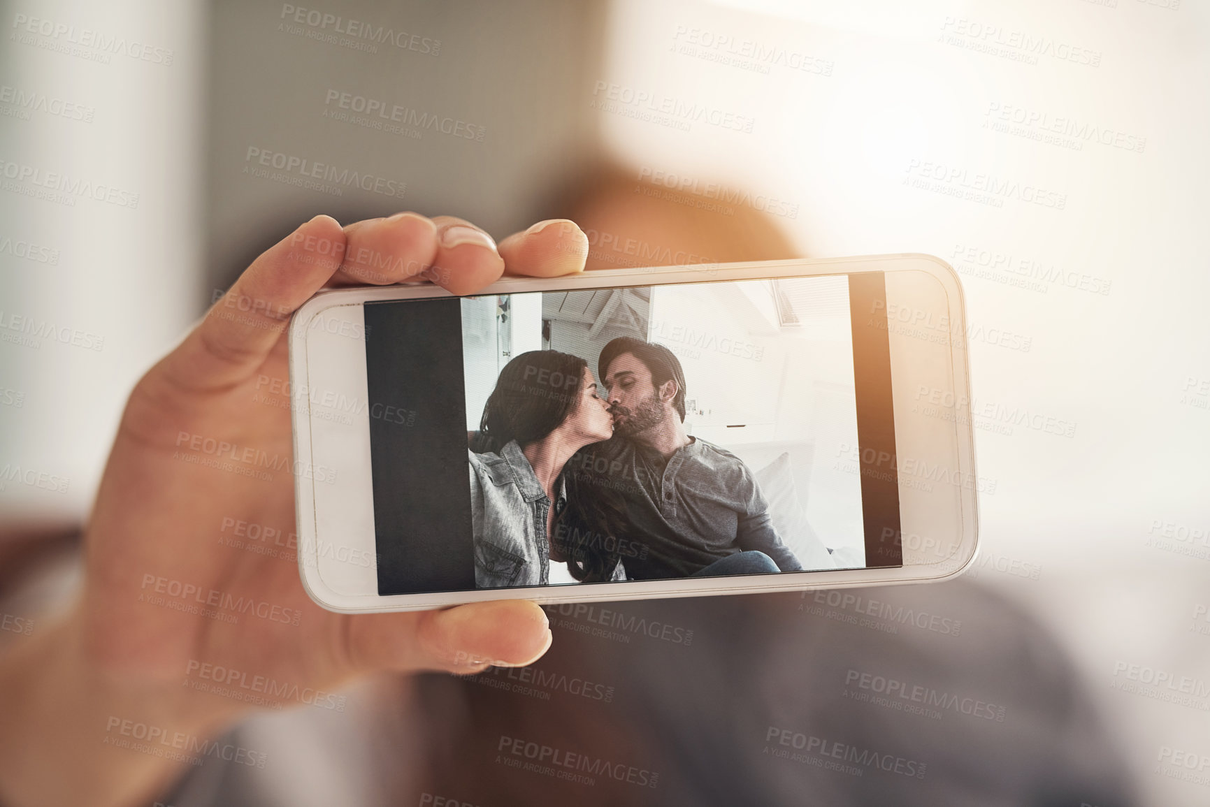 Buy stock photo Shot of an attractive young couple spending quality time at home