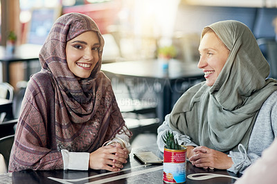 Buy stock photo Portrait of a happy young woman spending time with her friend in a cafe