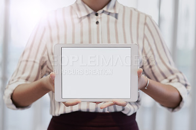 Buy stock photo Closeup shot of an unrecognizable businesswoman holding up a digital tablet with a blank screen in an office