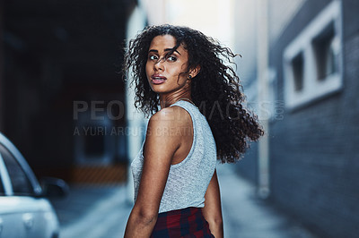 Buy stock photo Shot of an attractive young woman being catcalled in the city