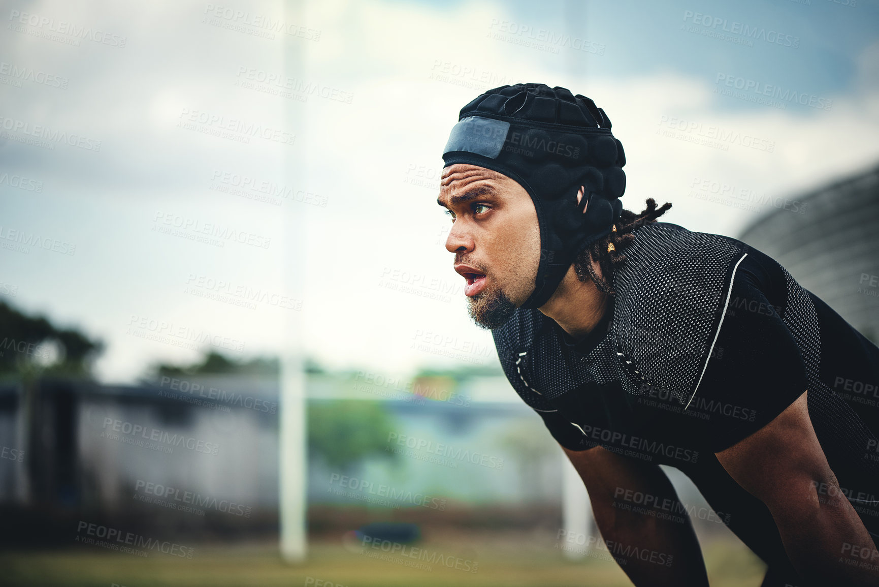 Buy stock photo Player, ready and rugby on field for game, competition and sports match with fitness, physical and active. African man, gear and athlete at stadium for workout, exercise and start with determination