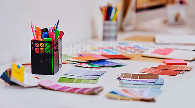 Buy stock photo Interior design, color swatches and stationery on desk for creativity, planning and palette in studio. Workshop, productivity or paint samples on table for renovation, home improvement or new project