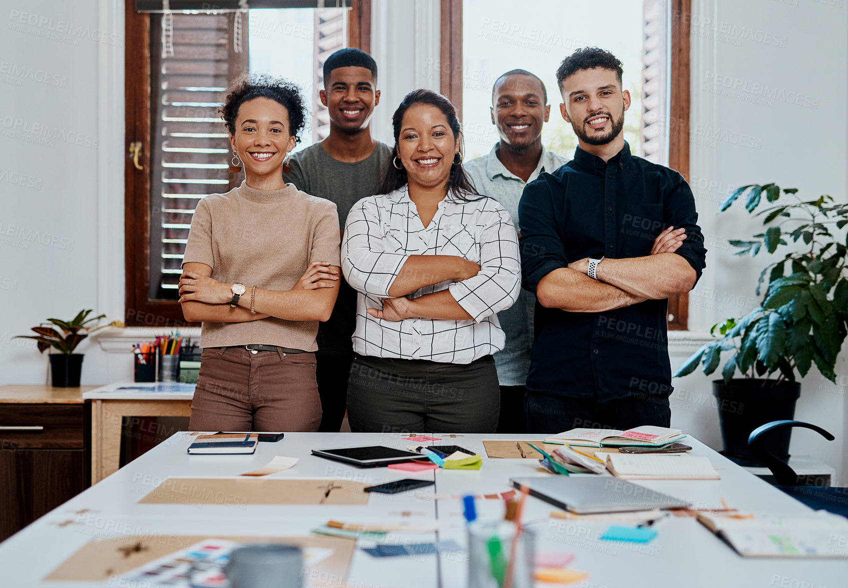 Buy stock photo Business people, happy and arms crossed at startup with portrait for solidarity at media company. Group, men and women with smile, synergy and connection with teamwork for project at creative agency