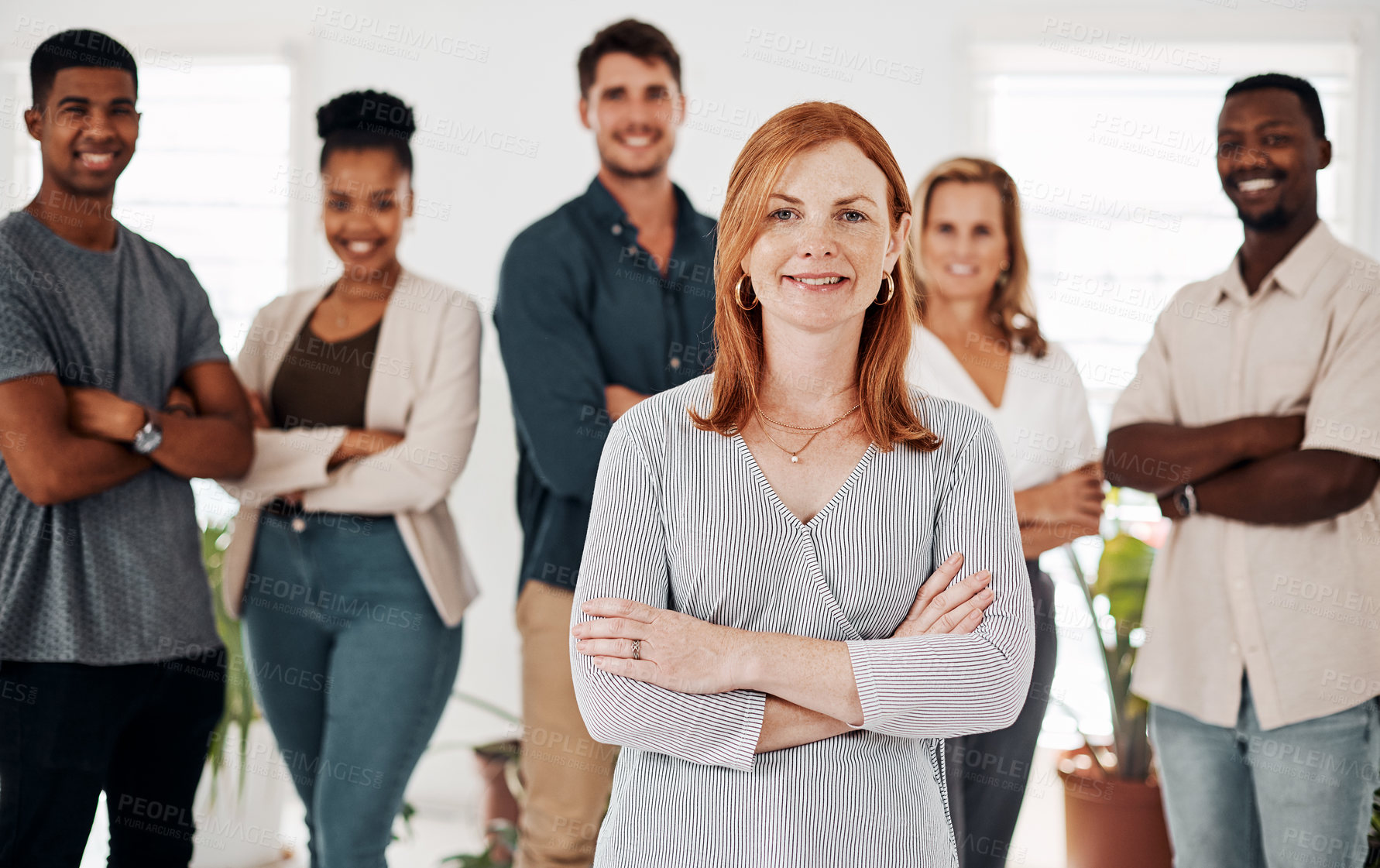 Buy stock photo Business people, portrait and arms crossed with team in office for leadership, company pride and happy for startup. Design group, collaboration and employees with diversity, creative agency and unity