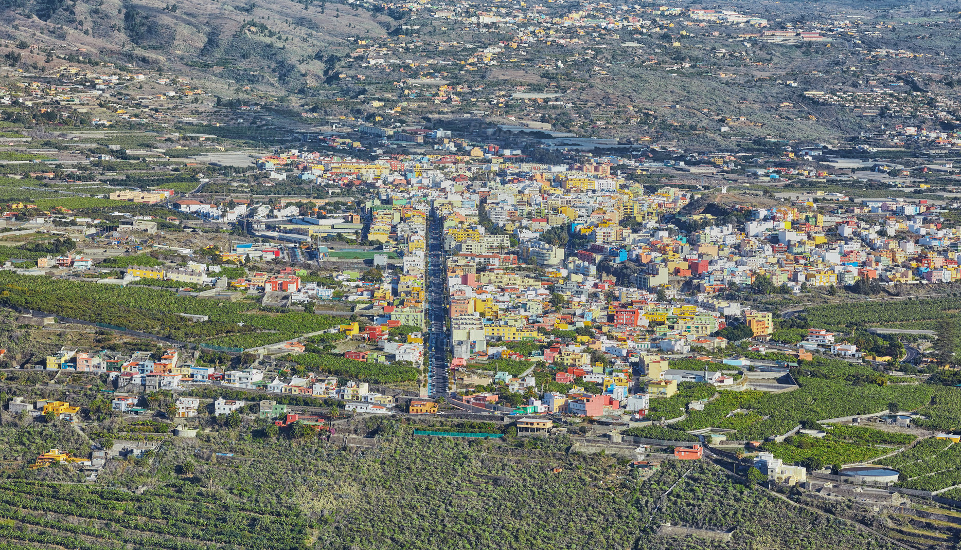 Buy stock photo Landscape aerial view of Los Llanos, La Palma in Canary Islands during the day. Scenic view of a city in an idyllic tourist travel destination from above. Small and beautiful seaside village