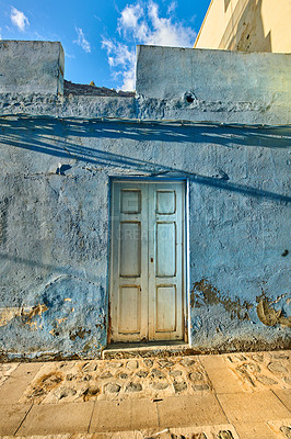 Buy stock photo Mysterious white door to a house or venue in Santa Cruz de La Palma in Spain. Beautiful cultural and traditional architecture in a small village. Old and ancient exterior of a building structure