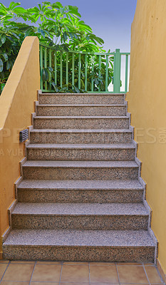 Buy stock photo Exterior architecture of a staircase on a building in a beautiful colonial style city of Santa Cruz de La Palma in Spain. Classic design of tiled steps with green plants in the background