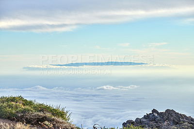 Buy stock photo Hiking mountain to view volcano through dense cloud cover in travel or tourism destination. Exploring scenic background skyscape of Roque de Los Muchachos, La Palma, Canary Islands, Spain from above