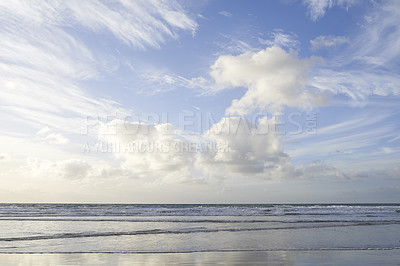 Buy stock photo Copy space at the sea with a cloudy blue sky above the horizon. Calm ocean waters washing onto beach shore. Coastal landscape for a relaxing summer getaway in Torrey Pines, San Diego in California