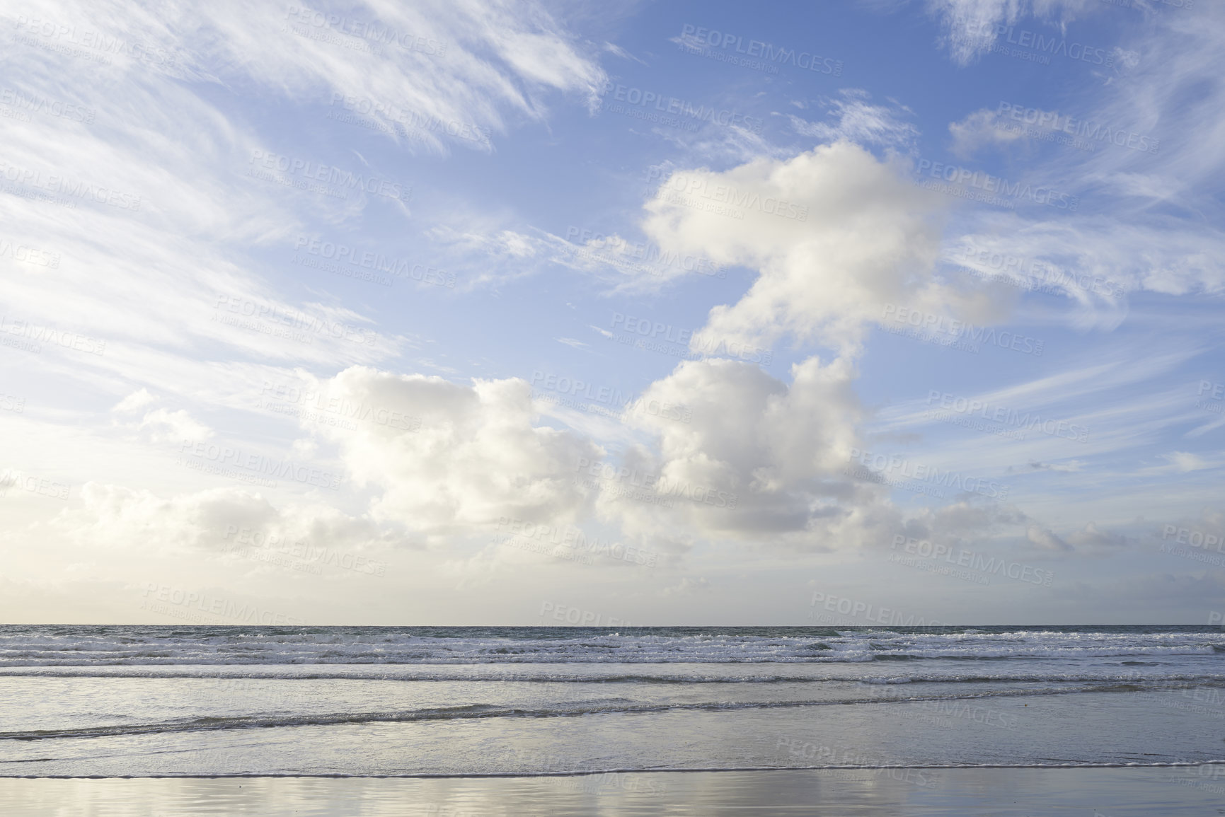 Buy stock photo Copy space at the sea with a cloudy blue sky above the horizon. Calm ocean waters washing onto beach shore. Coastal landscape for a relaxing summer getaway in Torrey Pines, San Diego in California