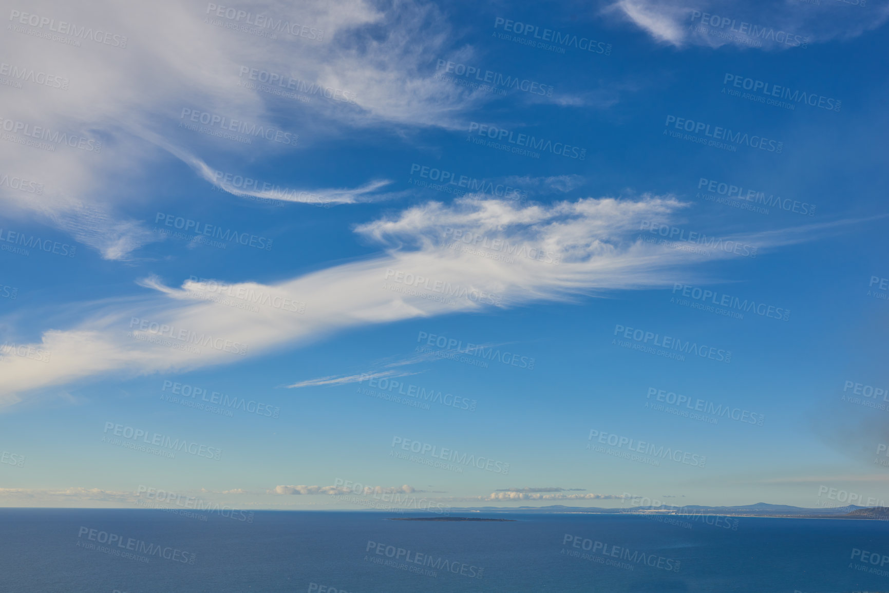 Buy stock photo Copy space and deep blue sea with a cloudy sky background above the horizon. Peaceful scenic coastal landscape for a relaxing and zen summer getaway. A wide open seascape background of a beach