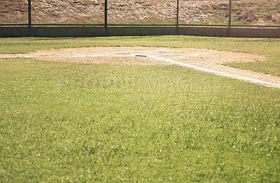 Buy stock photo Shot of a baseball lying on a field during a match