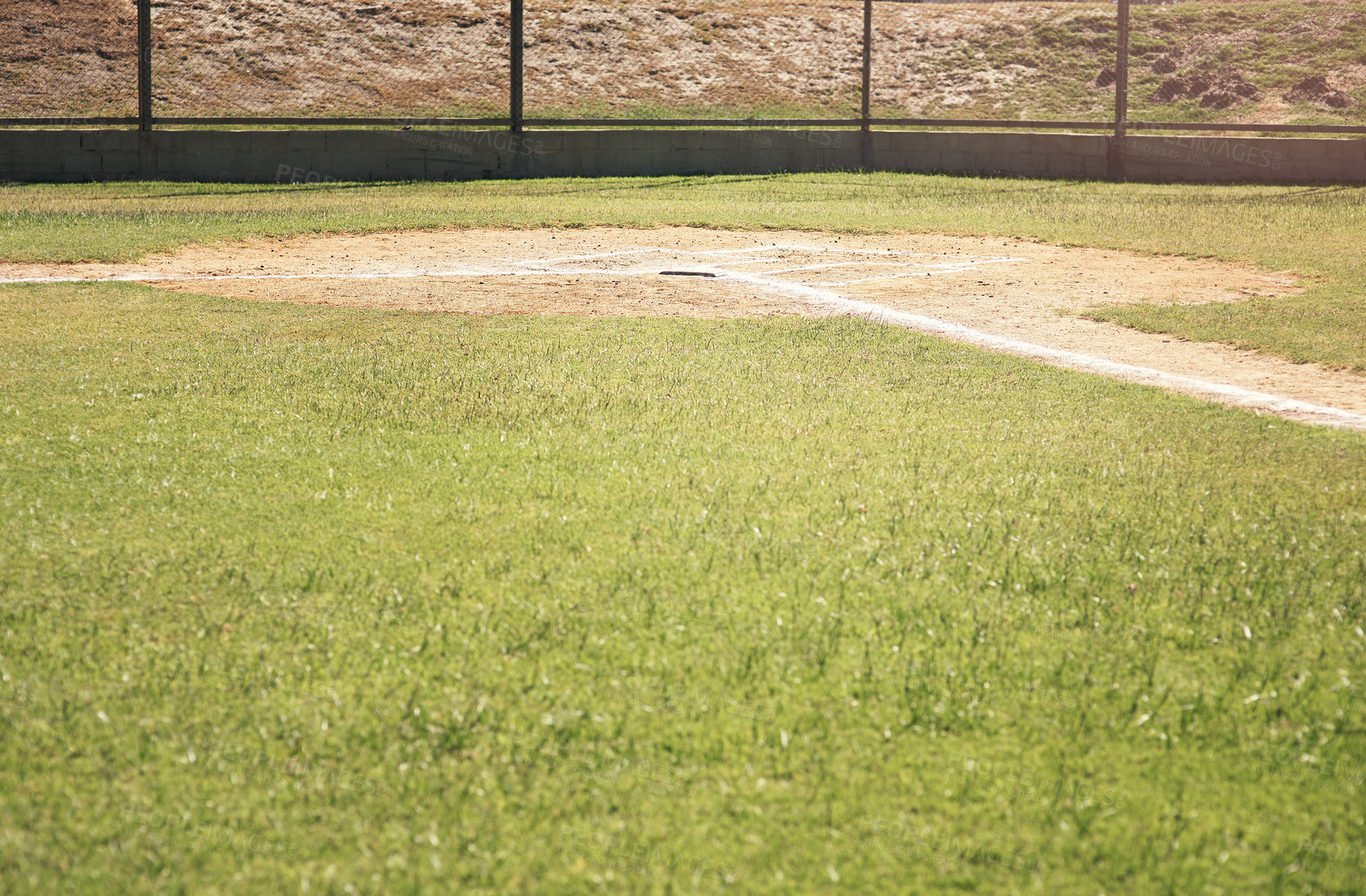 Buy stock photo Shot of a baseball lying on a field during a match