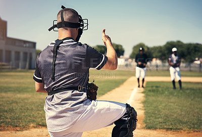 Buy stock photo Rearview shot of a young man giving thumbs up during a baseball match