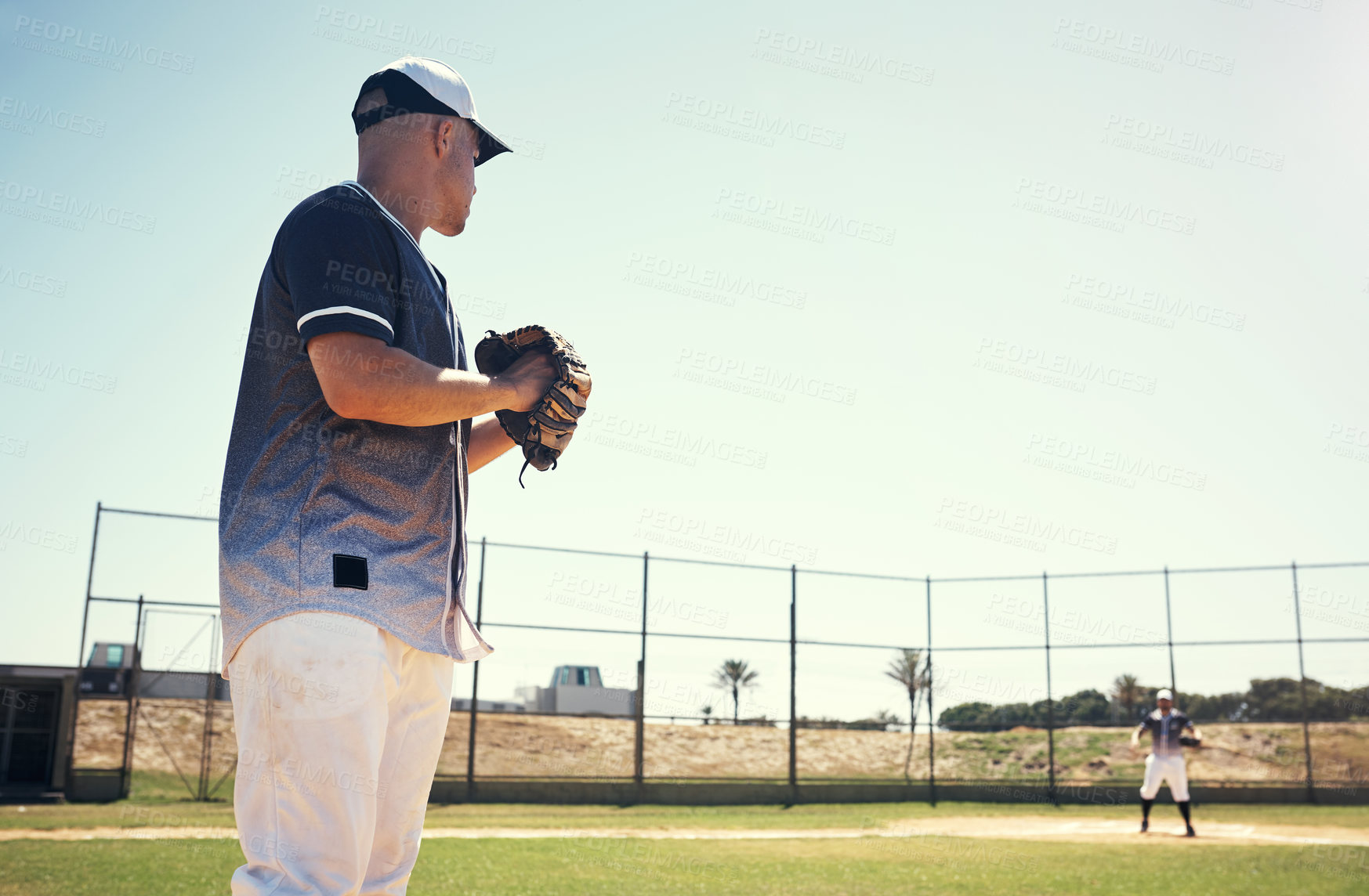 Buy stock photo Pitch, sports and games with man on baseball field for competition, training and performance. Action, exercise and championship with male athlete in stadium park for fitness, practice and club space