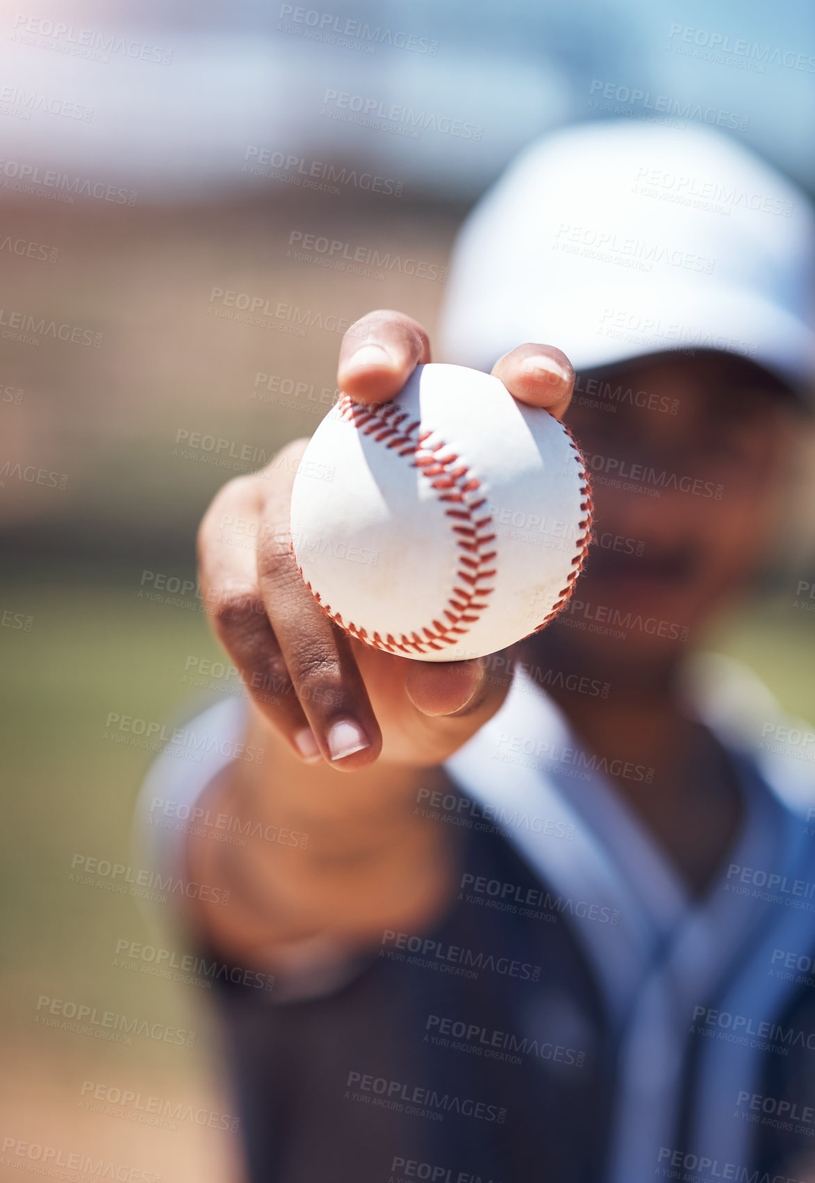 Buy stock photo Hand holding baseball, closeup and man for sport, field and training with blurred background in sunshine. Softball player, sports and zoom of ball for training, fitness and workout for competition