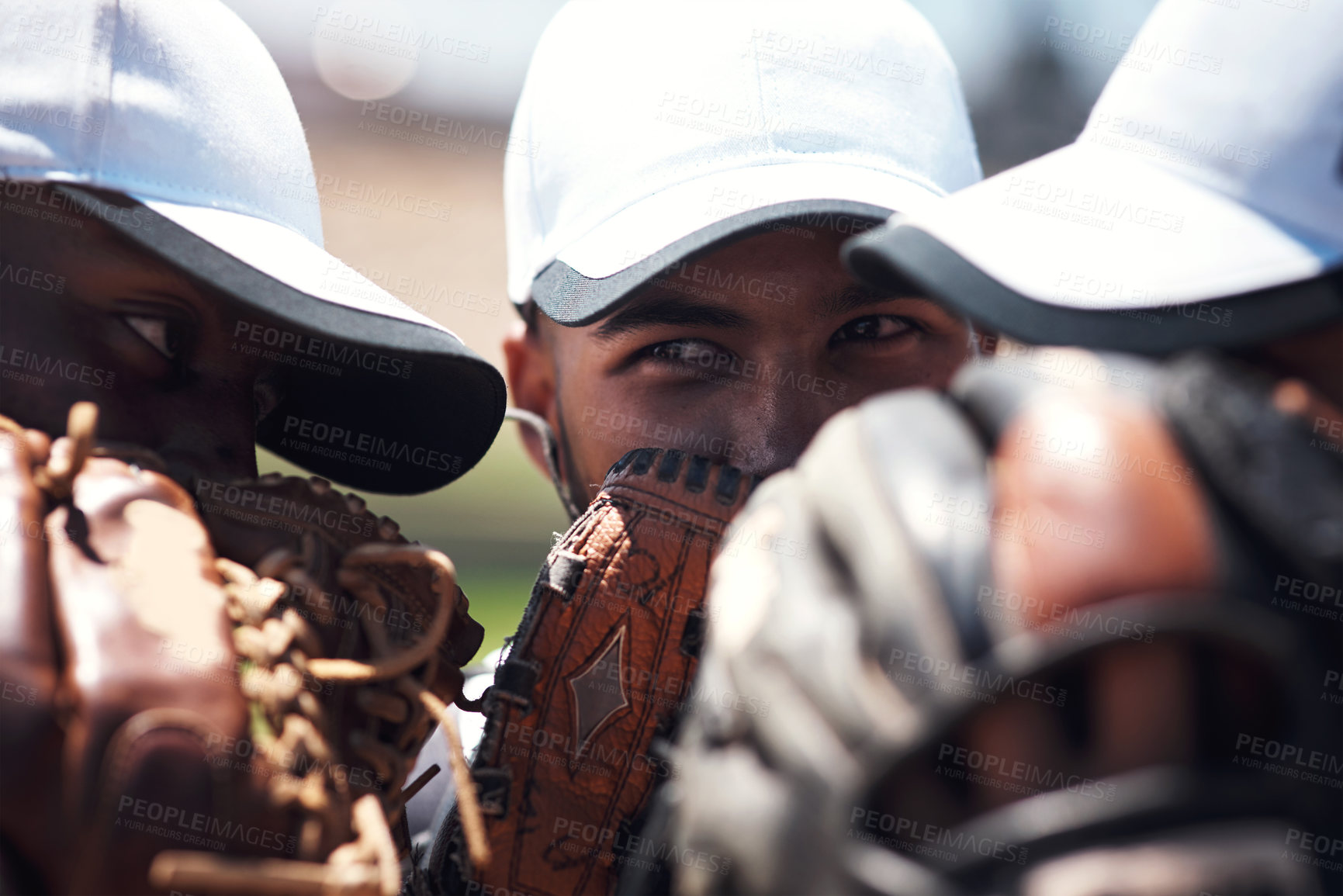 Buy stock photo Team, men and baseball player in huddle for game, planning or discussion for secret strategy on pitch. People, group and scrum with gloves to cover mouth for competition, sports or diversity on field