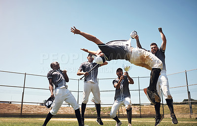 Buy stock photo Shot of a group of young baseball players celebrating after winning a game