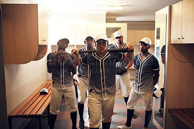 Buy stock photo Shot of a group of young men walking into a locker room at a baseball game