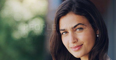 Buy stock photo Cropped shot of a beautiful young woman standing outdoors