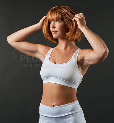 Buy stock photo Thinking, exercise and woman with fitness, smile and model on gray studio background. Athlete, girl and sportswear for workout, wellness training and health challenge with confidence and proud energy