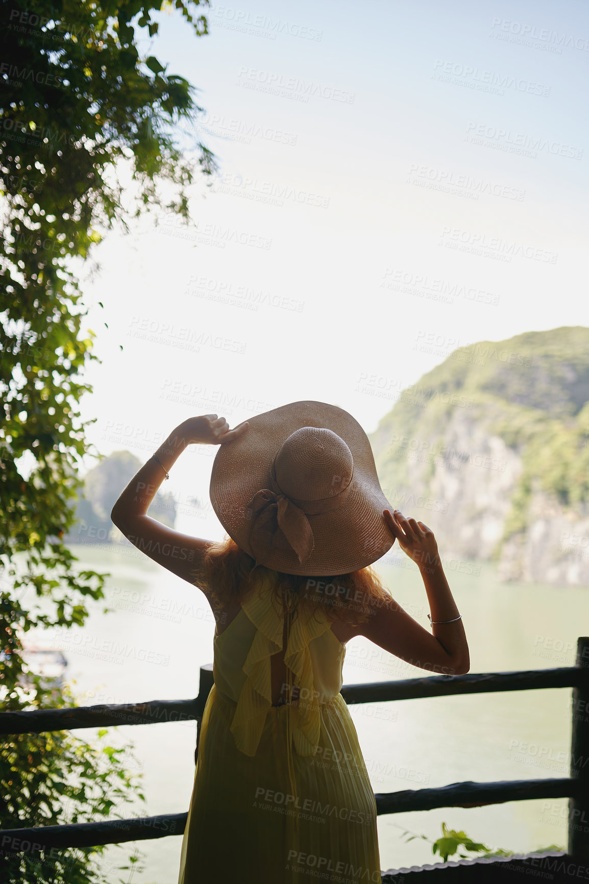 Buy stock photo Rearview shot of a young woman enjoying a vacation in Vietnam