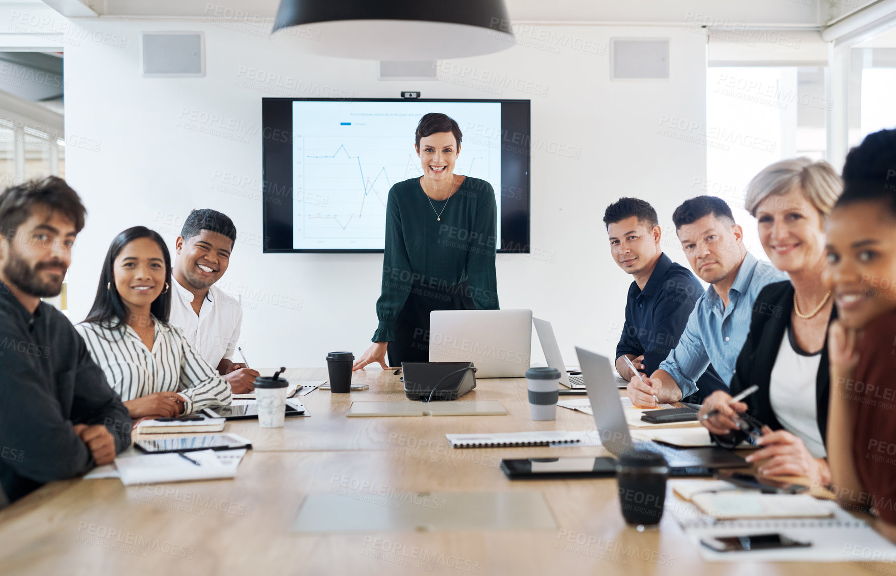 Buy stock photo Portrait of a group of businesspeople having a meeting in a modern office