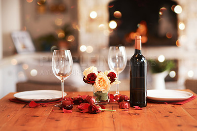 Buy stock photo Romantic, dinner table and setup for valentines day, fine dining or date at indoor night restaurant. Interior diner with wine glasses prepared with roses and champagne for evening couple reservation