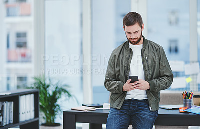 Buy stock photo Man, phone and typing in office for contact, client feedback and job opportunity in creative industry. Designer, mobile and space at desk for email, startup review and career growth in small business