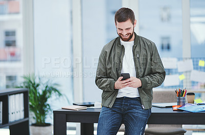 Buy stock photo Man, phone and happy in office for review, client feedback and job opportunity in creative industry. Designer, space and mobile at desk for communication, good news or career growth in small business