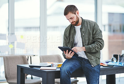 Buy stock photo Man, tablet and typing in office for contact, client feedback and new opportunity in creative industry. Designer, tech and space at table for email, startup review and brainstorming in small business