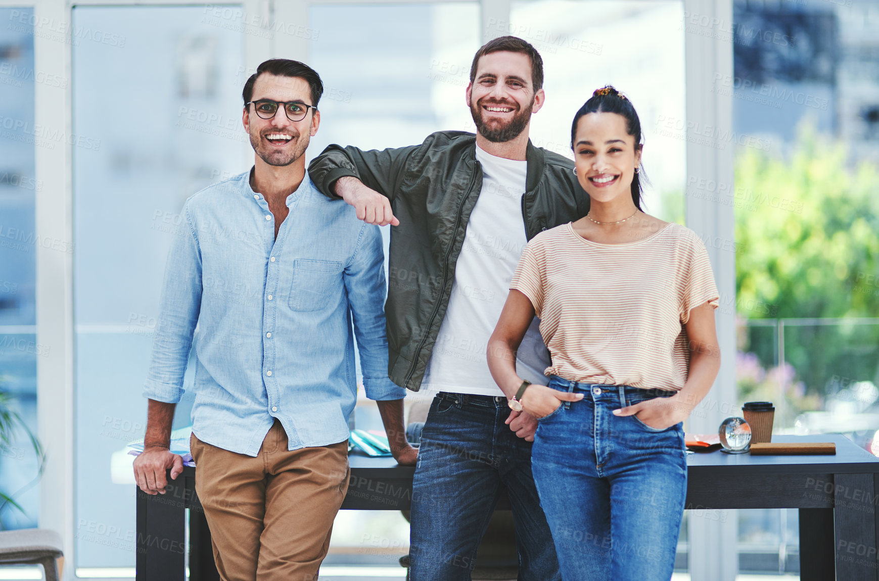 Buy stock photo Portrait of a group of young designers working together in an office