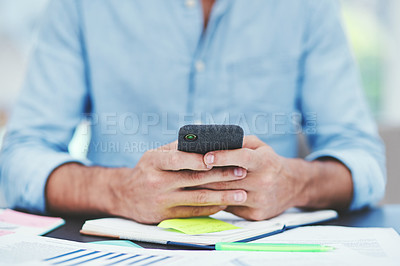 Buy stock photo Businessman, hands and typing with phone for news, schedule planning or social media at office desk. Closeup, man or designer with mobile smartphone for online browsing, scrolling or app at workplace