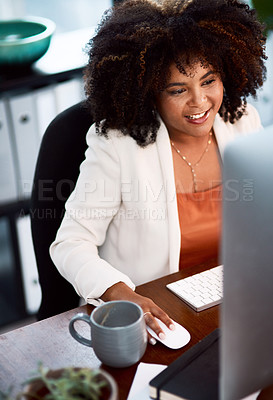 Buy stock photo Cropped shot of a young businesswoman working at her desk