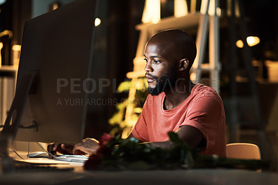 Buy stock photo Night, black man and serious in office, computer and video editing with software, planning and freelancer. Dark, entrepreneur and creative for content creation, person and business in social media