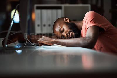 Buy stock photo Cropped shot of a man falling asleep while working late at the office