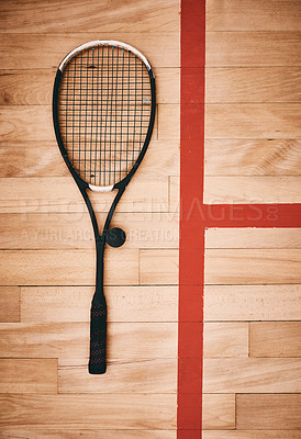 Buy stock photo Shot of a squash racquet on the floor of a squash court