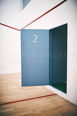 Buy stock photo Sport, empty or door of court for squash, activity or open for availability in fitness center. Racquetball, interior or second entrance in gym facility for training club, competition grounds or games