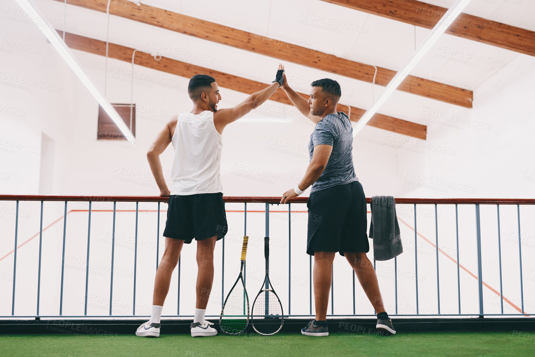 Buy stock photo High five, squash and success with sports men in gym together for exercise, fitness or hobby. Back, celebration and support with happy friends in health club for challenge, competition or motivation