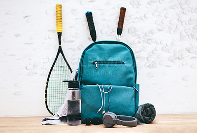 Buy stock photo Shot of a sports bag and other items in an empty squash court